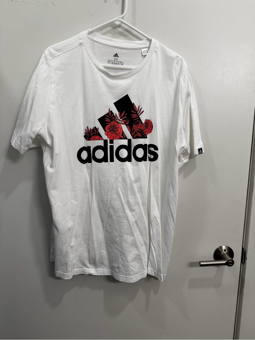 adidas White Short Sleeve Tee with Black Logo and Red Floral Accent